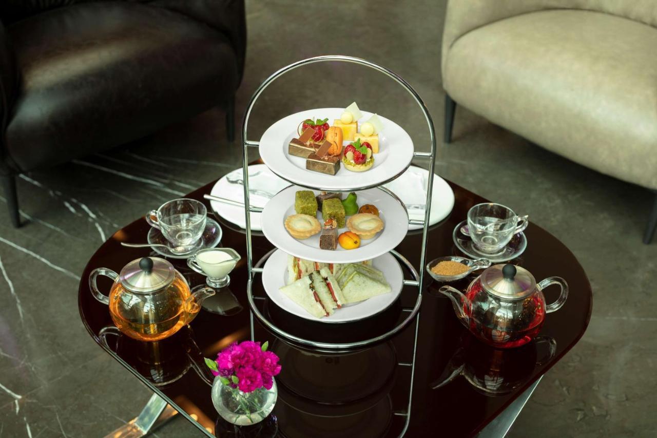 Radisson Blu Atria Bengaluru Hotel Exterior foto Afternoon tea at the InterContinental Hotel, London